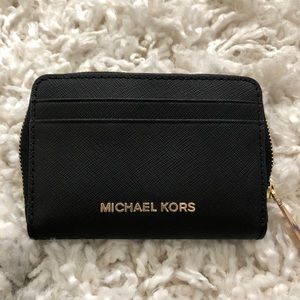 Brand new Michael Kors leather mini wallet